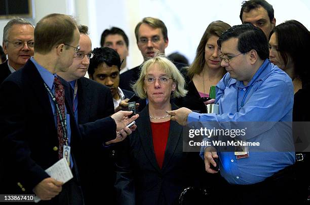 Sen. Patty Murray is followed by reporters as she arrives for a meeting between Republican and Democratic members of the "Super Committee", or Joint...