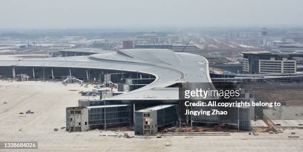 aerial view of chengdu tianfu international airport terminal under construction - chengdu stock pictures, royalty-free photos & images
