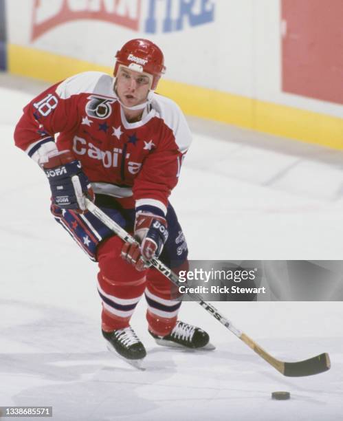 Randy Burridge of Canada and Left Wing for the Washington Capitals in motion skating on the ice during the NHL Prince of Wales Conference Adams...