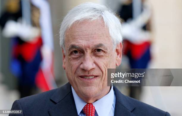 Chilean President Sebastian Pinera makes a statement next to French President Emmanuel Macron following their working lunch at the Elysee...