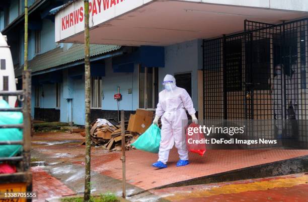 Kozhikode, India A health official stands outside the Kozhikode Medical College Hospital ward, which has been converted into a Nipah virus isolation...