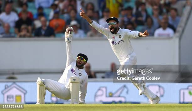 India captain Virat Kohli celebrates with Rishabh Pant after winning the Fourth LV= Insurance Test Match between England and India at The Kia Oval on...