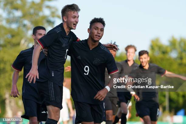 Armindo Sieb of Germany U19 celebrates after scoring their side`s first goal with teammate Mesut Kesik of Germany U19 during the international...