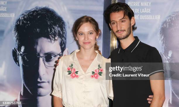 Actors Lou de Laage and Pierre Niney attend the "Boite Noire" premiere at UGC Cine Cite Des Halles on September 06, 2021 in Paris, France.