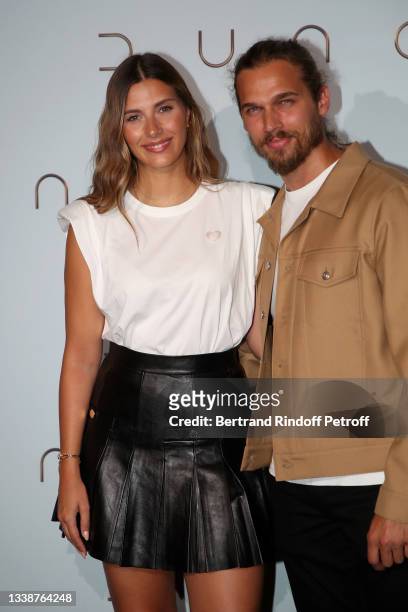 Camille Cerf and a guest attend the "Dune" photocall At Le Grand Rex on September 06, 2021 in Paris, France.