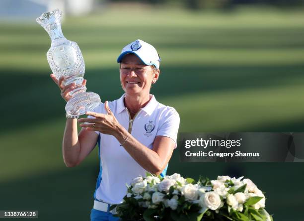 Team Europe Captain Catriona Matthew poses with the Solheim Cup after their win over Team USA during day three of the Solheim Cup at the Inverness...