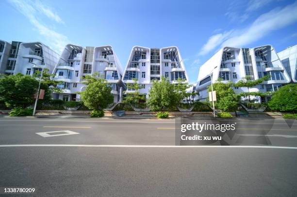 empty asphalt road in front of villa - futuristic house stock pictures, royalty-free photos & images