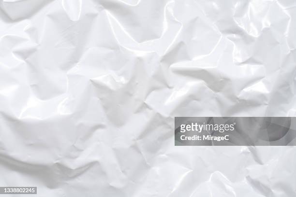 crumpled plastic bag surface texture - plastic - fotografias e filmes do acervo