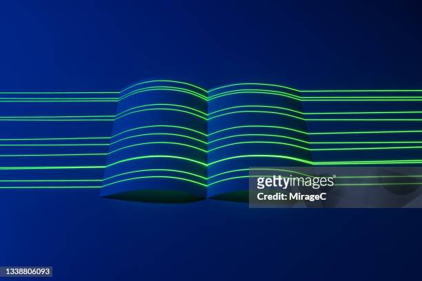 laser scanning book shaped paper - sfogliare libro foto e immagini stock
