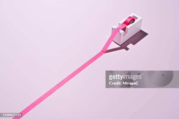 tape dispenser with a long adhesive tape - 斜めから見た図 ストックフォトと画像