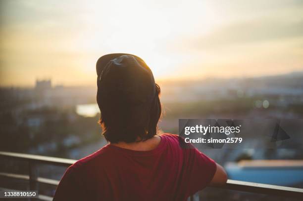 sunrise on balcony - watching sunrise stock pictures, royalty-free photos & images