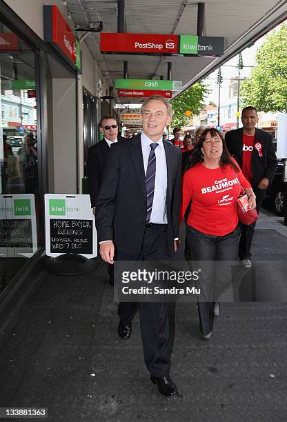 Phil Goff, Leader of the Labour Party and Carol Beaumont of Labour campaign along the streets of Onehunga on November 22, 2011 in Auckland, New...