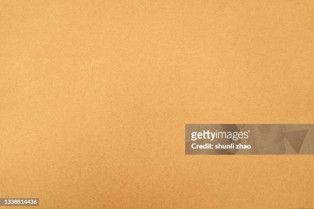 brown paper texture background - brown paper stock pictures, royalty-free photos & images