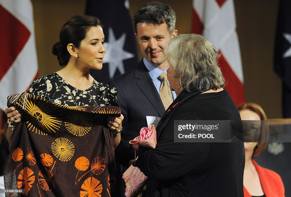 Denmark's Crown Prince Frederik (C) and