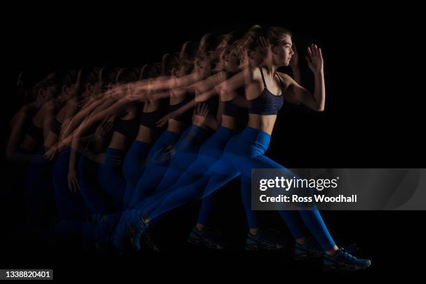 female sprinter in motion - double exposure running stock pictures, royalty-free photos & images