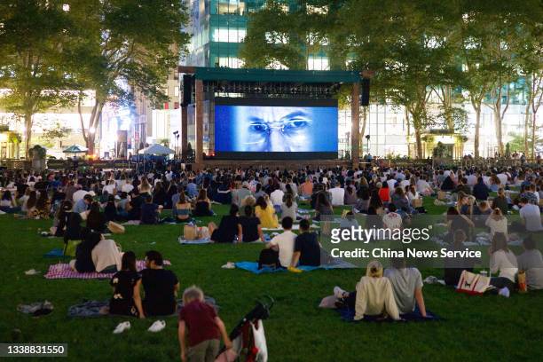 People watch outdoor movie at Bryant Park during the Labor Day holiday on September 6, 2021 in New York, United States.