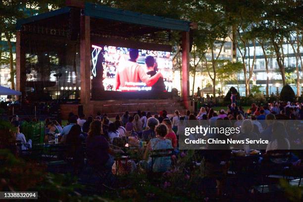 People watch outdoor movie at Bryant Park during the Labor Day holiday on September 6, 2021 in New York, United States.