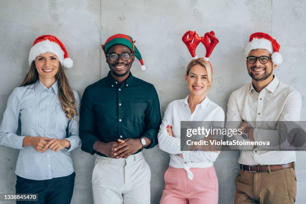 cheerful business team during christmas celebration in the office. - corporate celebration imagens e fotografias de stock