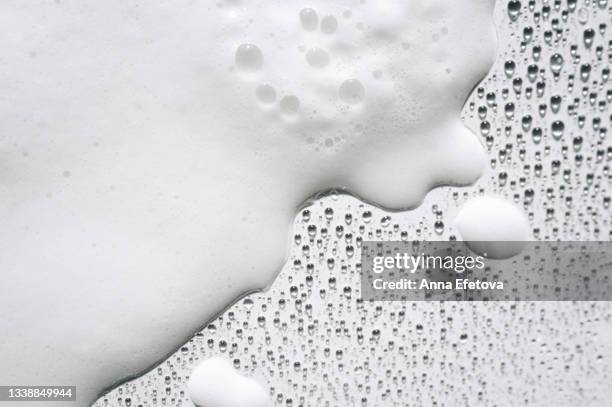 background made of white foam and many drops on white surface. backdrop for your design. flat lay style - soap sud stock pictures, royalty-free photos & images