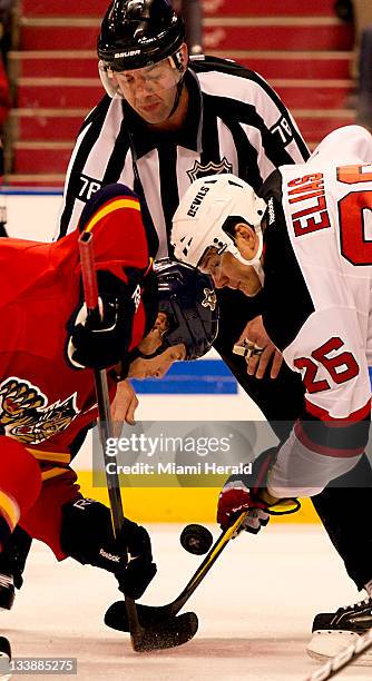 Florida Panthers Stephen Weiss and New Jersey Devils defenseman Anton Volchenkov faceoff in the first period at Bank Atlantic Center in Sunrise,...