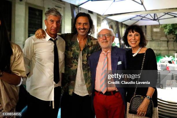 Maurizio Cattelan, Fabio Novembre, Emilio Isgrò and Scilla Isgrò attend the Driade & Lavazza Event on September 05, 2021 in Milan, Italy.