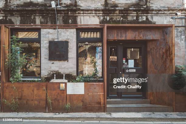facade of a small shop - montra imagens e fotografias de stock
