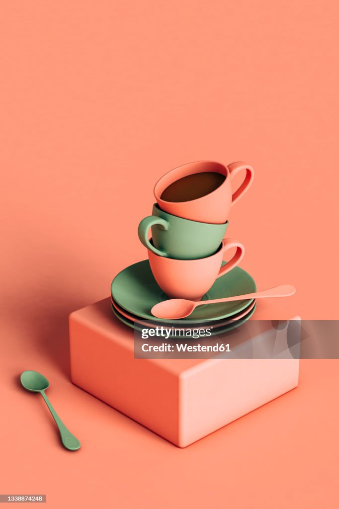 Three dimensional render of three coffee cups stacked on top of plates lying on square block