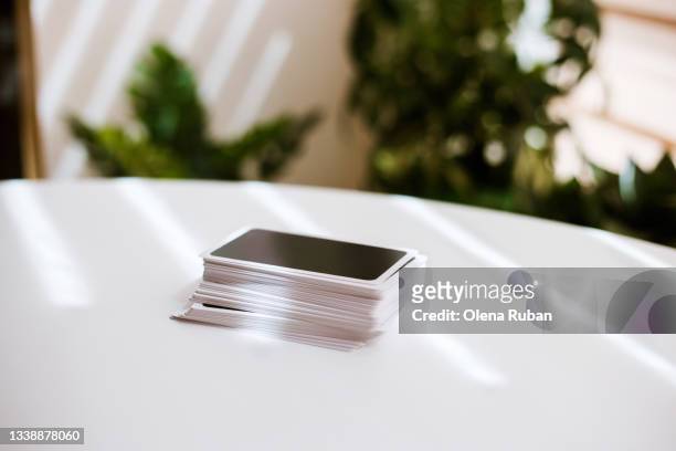 playing cards on white table. - carte tarot photos et images de collection
