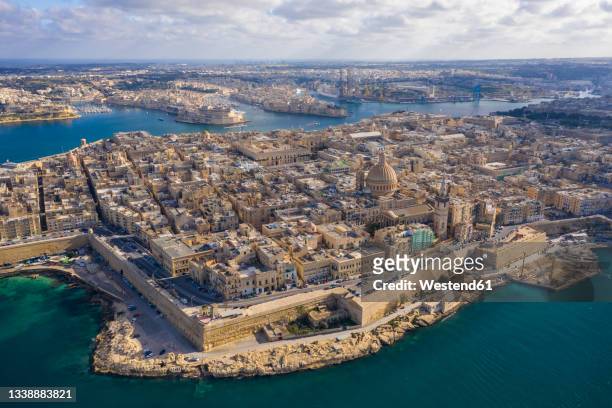 malta, south eastern region, valletta, aerial view of historic coastal city - la valletta foto e immagini stock