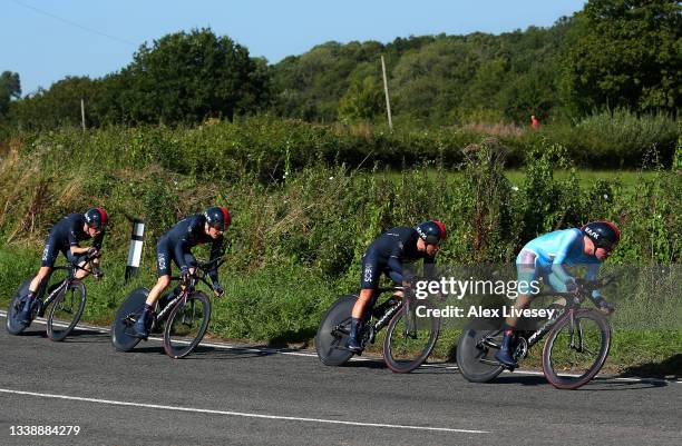 Richie Porte of Australia and Ethan Hayter of United Kingdom and Team INEOS Grenadiers turquoise points jersey lead their teammates during the 17th...