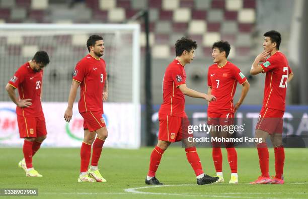 Players of China PR looks dejected following defeat in the 2022 FIFA World Cup Qualifier match between Japan and China PR at Khalifa International...