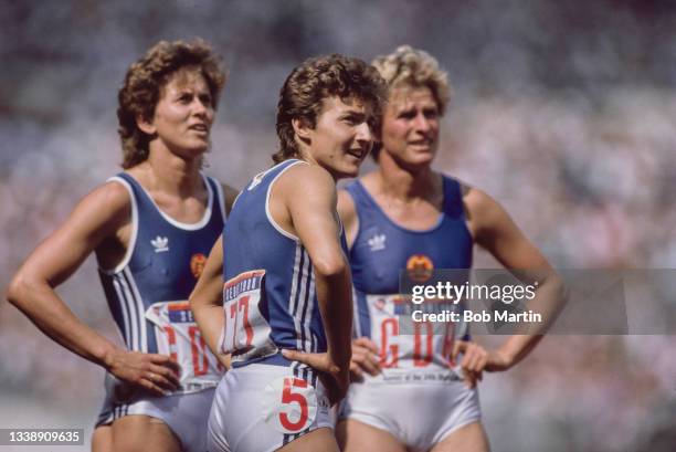 Marlies Goehr, Silke Moller and Ingrid Lange of East Germany after finishing in second place in the Women's 4 x 100 metres relay at the XXIV Summer...