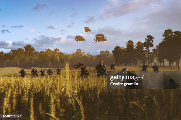 futuristic soldiers walking in wheat field - robot army stock pictures, royalty-free photos & images