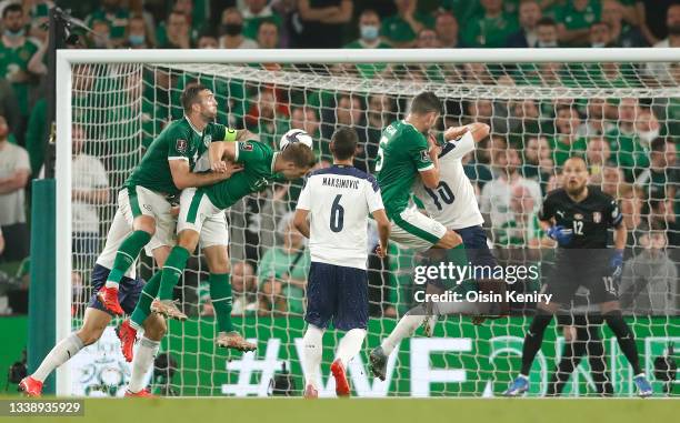 Shane Duffy of Republic of Ireland has a headed shot before Nikola Milenkovic of Serbia scores an own goal during the 2022 FIFA World Cup Qualifier...