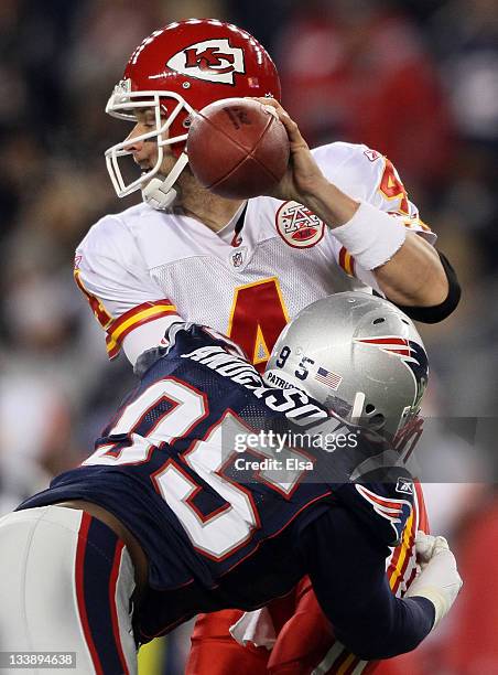 Tyler Palko of the Kansas City Chiefs is sacked by Mark Anderson of the New England Patriots on November 21, 2011 at Gillette Stadium in Foxboro,...