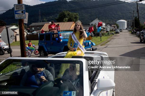 Participants march and drive through town in the annual Labor Day parade on September 6, 2021 in Marmet, West Virginia.