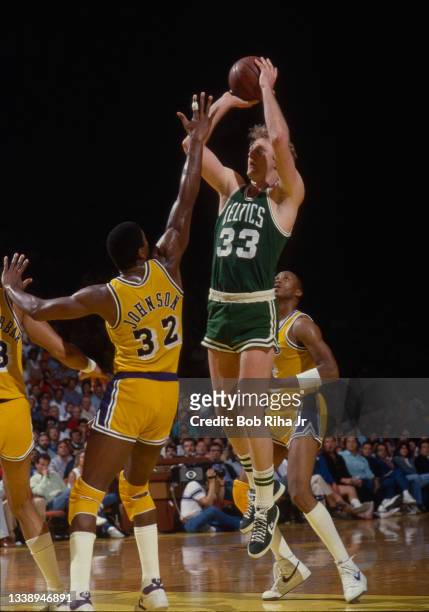Boston Celtics Larry Bird shoots over Los Angeles Lakers Magic Johnson during 1985 NBA Finals between Los Angeles Lakers and Boston Celtics, June 2,...