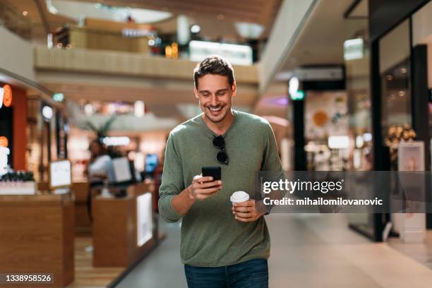 text messaging and coffee time - inside coffe store stock pictures, royalty-free photos & images