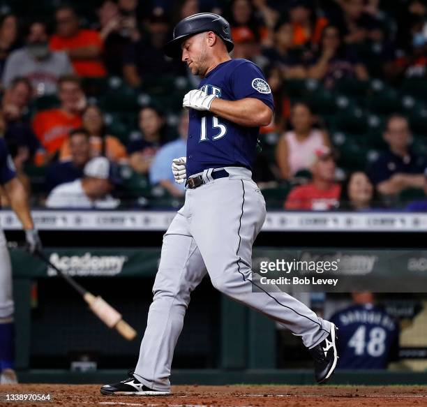 Kyle Seager of the Seattle Mariners scores after hitting a solo home run in the sixth inning against the Houston Astros at Minute Maid Park on...