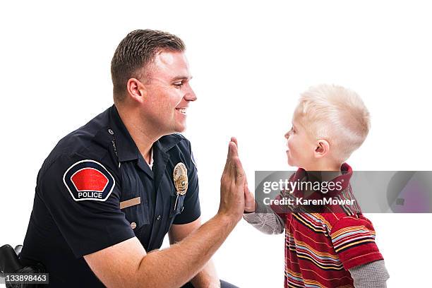 police high five - respect kids stock pictures, royalty-free photos & images