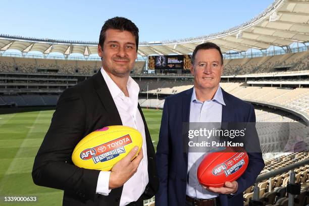 Andrew Embley and John Worsfold pose after being announced as the medal presenters for the Norm Smith Medal and the Jock McHale Medal for the 2021...