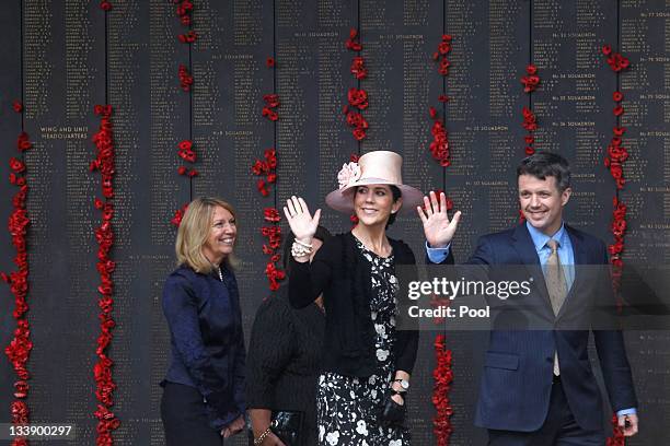 Princess Mary of Denmark and Prince Frederik of Denmark wave during their visit to the Australian War Memorial on November 22, 2011 in Canberra,...