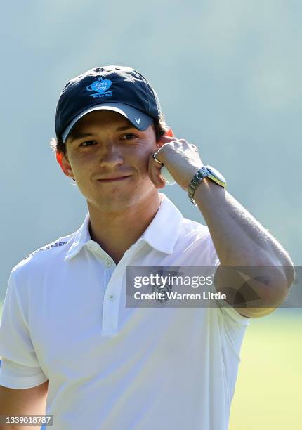 Tom Holland looks on during the Pro-Am event prior to The BMW PGA Championship at Wentworth Golf Club on September 08, 2021 in Virginia Water,...