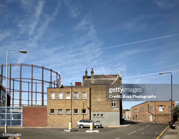 old gasometer in dalston, east london, in the london borough of hackney - hackney stock pictures, royalty-free photos & images