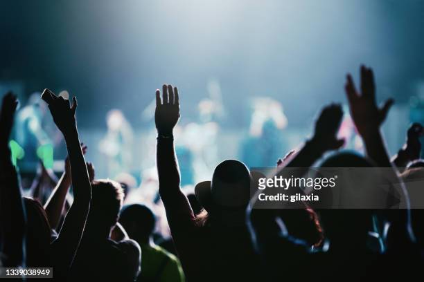 rave party silhouettes. - concert stock pictures, royalty-free photos & images