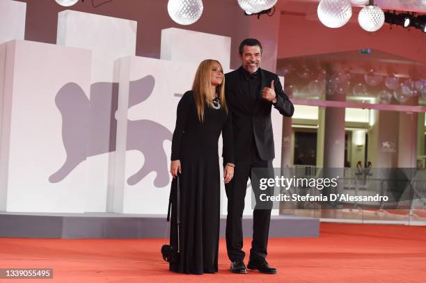 Sabrina Knaflitz and Alessandro Gassman attend the red carpet of the movie "Old Henry" during the 78th Venice International Film Festival on...