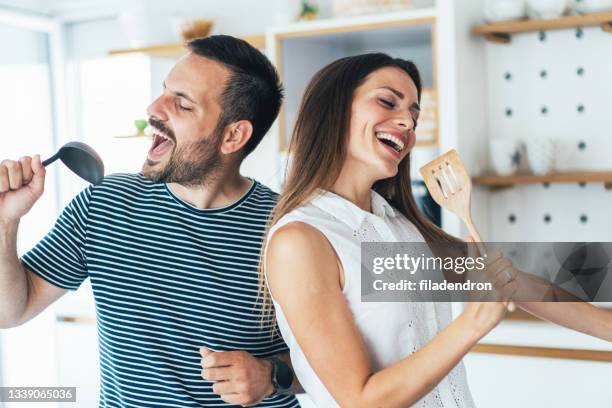 happy couple - couple singing stock pictures, royalty-free photos & images