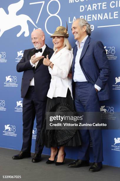 Sergio Rizzini, Simona Ventura and Giovanni Terzi attend the photocall of "Le 7 Giornate Di Bergamo" during the 78th Venice International Film...