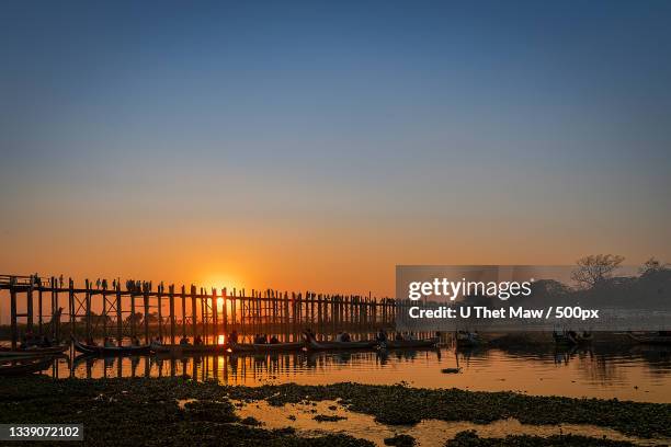 scenic view of sea against clear sky during sunset,mandalay,myanmar - mandalay foto e immagini stock