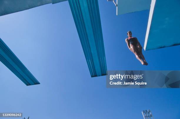 Loudy Tourkey of Australia performs her routine during the Women's 10m platform diving competition at the International Swimming Hall of Fame...